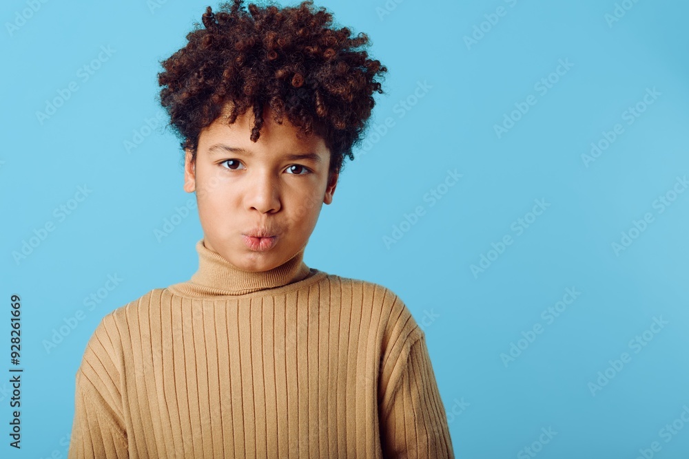 A young african american boy in a turtle neck sweater making a hilarious face, capturing a moment of pure joy and innocence A young african american boy in a turtle neck sweater making a hilarious face, capturing a moment of pure joy and innocence
