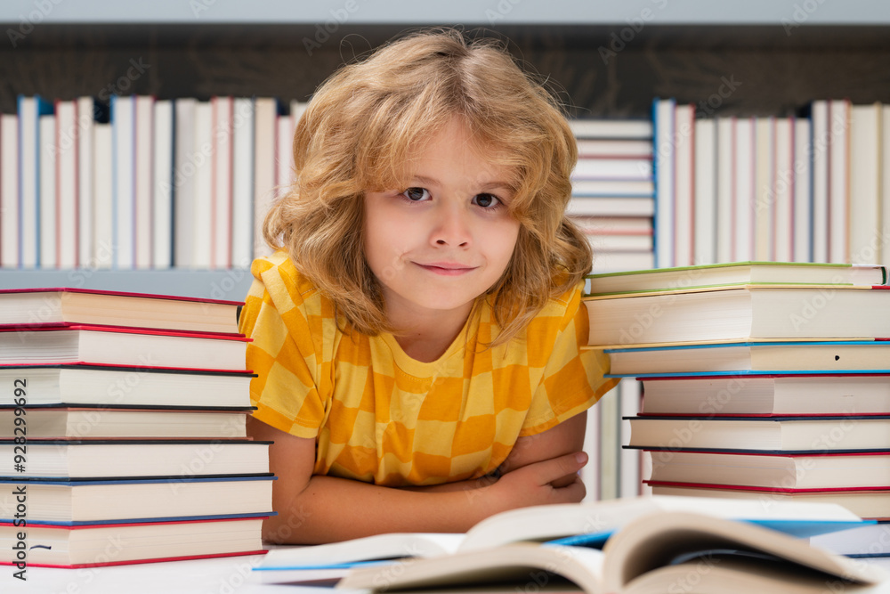 Education Concept. Pupil with pile of books. Children enjoying book story in school library. Kids imagination, interest to literature. Kids clever. Child study read book in class. Education Concept. Pupil with pile of books. Children enjoying book story in school library. Kids imagination, interest to literature. Kids clever. Child study read book in class.