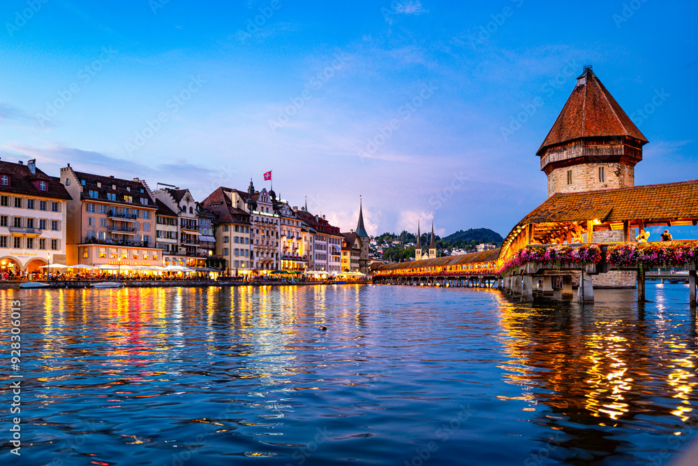 Lucern city with famous Chapel Bridge. Lucerne city view. Canton of Lucerne. Lucern Switzerland. Sunrise in historic city center of Lucerne with famous Chapel Bridge and lake Lucerne. Lucern city with famous Chapel Bridge. Lucerne city view. Canton of Lucerne. Lucern Switzerland. Sunrise in historic city center of Lucerne with famous Chapel Bridge and lake Lucerne.