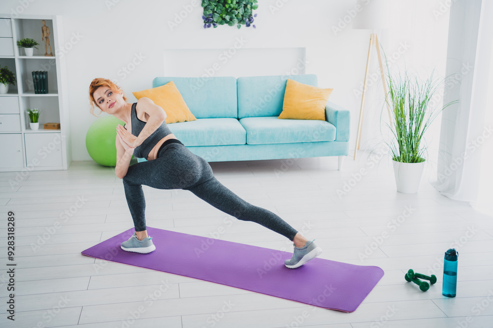 Full body portrait of pretty sportive young woman fitness yoga mat home gym workout indoors Full body portrait of pretty sportive young woman fitness yoga mat home gym workout indoors