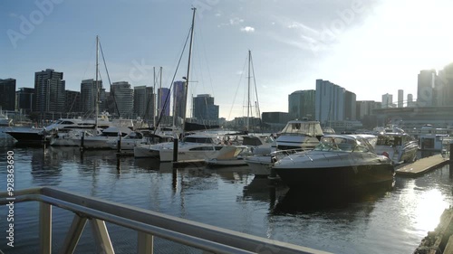 Beautiful pan of harbour and marina in Melbourne on sunny day photo