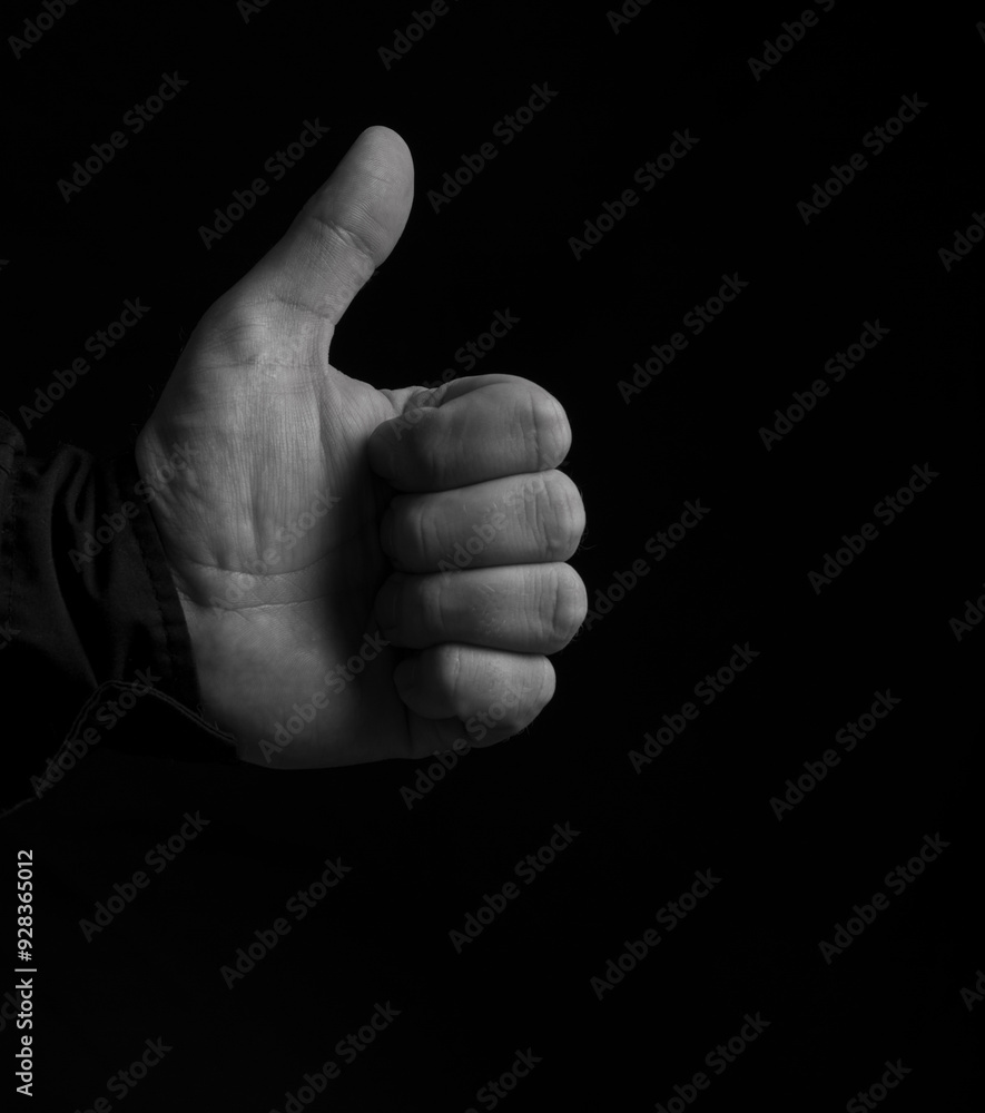 Like gesture. Close-up hand showing thumbs up. Man hands showing thumbs up. Support encourage. Like gesture. Close-up hand showing thumbs up. Man hands showing thumbs up. Support encourage.