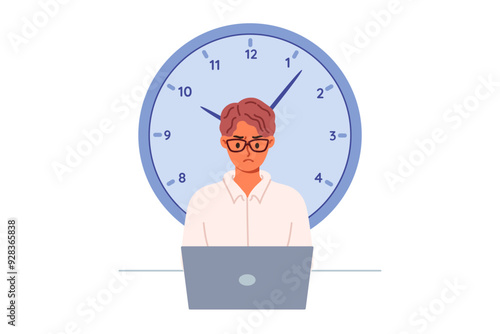 Approaching deadline for male freelancer working with laptop causes stress and desire to quit. Large clock reminds of deadline, and improves productivity of focused office clerk or manager.