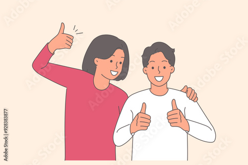 Happy couple shows thumbs up in agreement and hugs enjoying long-awaited meeting