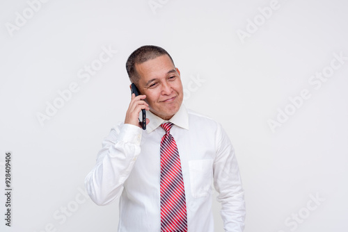 A middle aged asian manager talking to a client over the phone. Isolated on a white background.