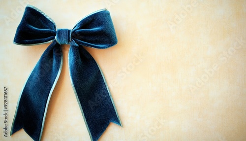 Blue Velvet Bow on Beige Background