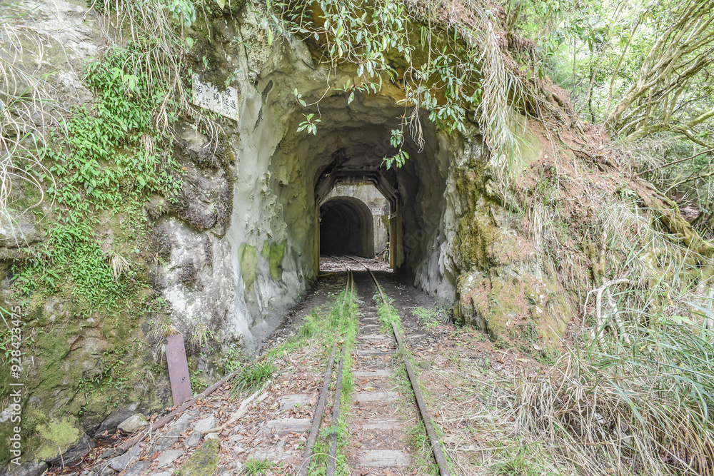 Beautiful But Abandoned Mianyue Line Railway With Tunnels And Thousand People Cave (Qianrendong) At The Hiking Trail To Water Forest (Shuiyang Forest), Alishan National Scenic Area, Chiayi,Taiwan Beautiful But Abandoned Mianyue Line Railway With Tunnels And Thousand People Cave (Qianrendong) At The Hiking Trail To Water Forest (Shuiyang Forest), Alishan National Scenic Area, Chiayi,Taiwan