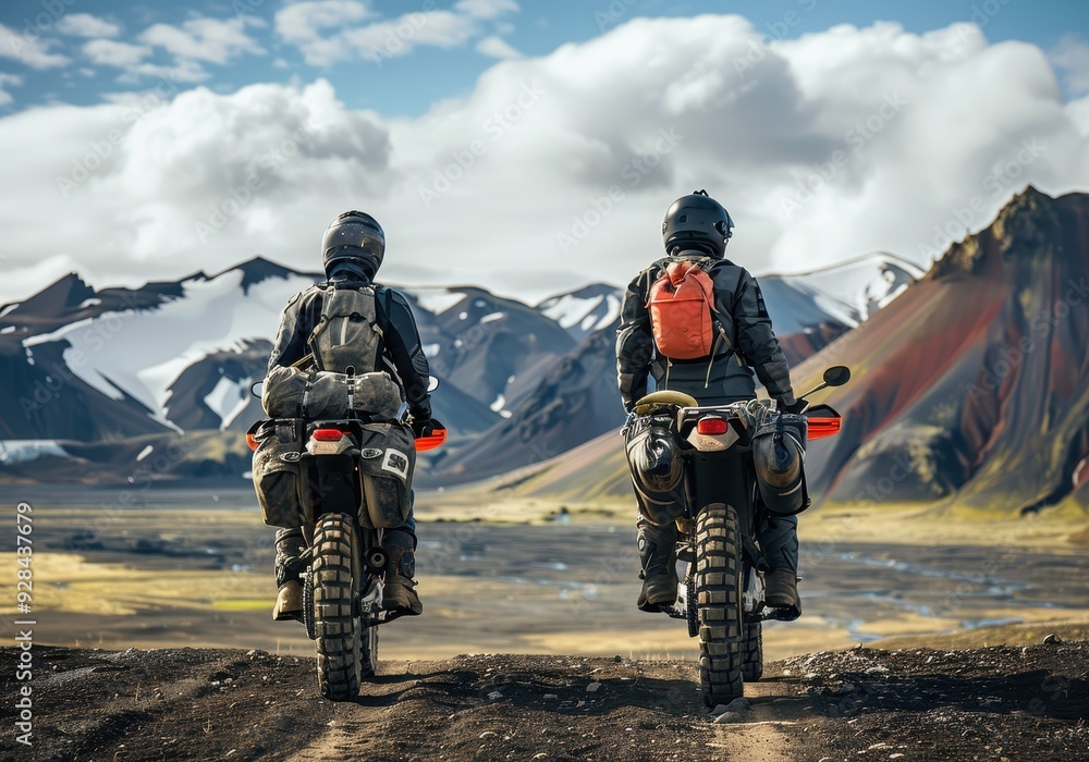Two enduro motorcycles parked on a desert dirt road in Iceland surrounded by mountains Off road travel and extreme lifestyle Two enduro motorcycles parked on a desert dirt road in Iceland surrounded by mountains Off road travel and extreme lifestyle