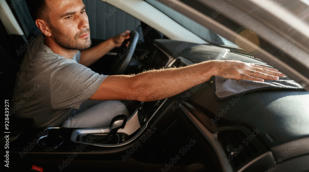 Man is cleaning interior of his car Man is cleaning interior of his car