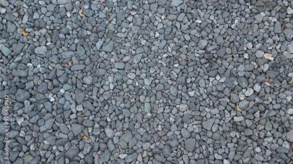 Texture of road made of small gray stones with slight camera movement. Texture of road made of small gray stones with slight camera movement.