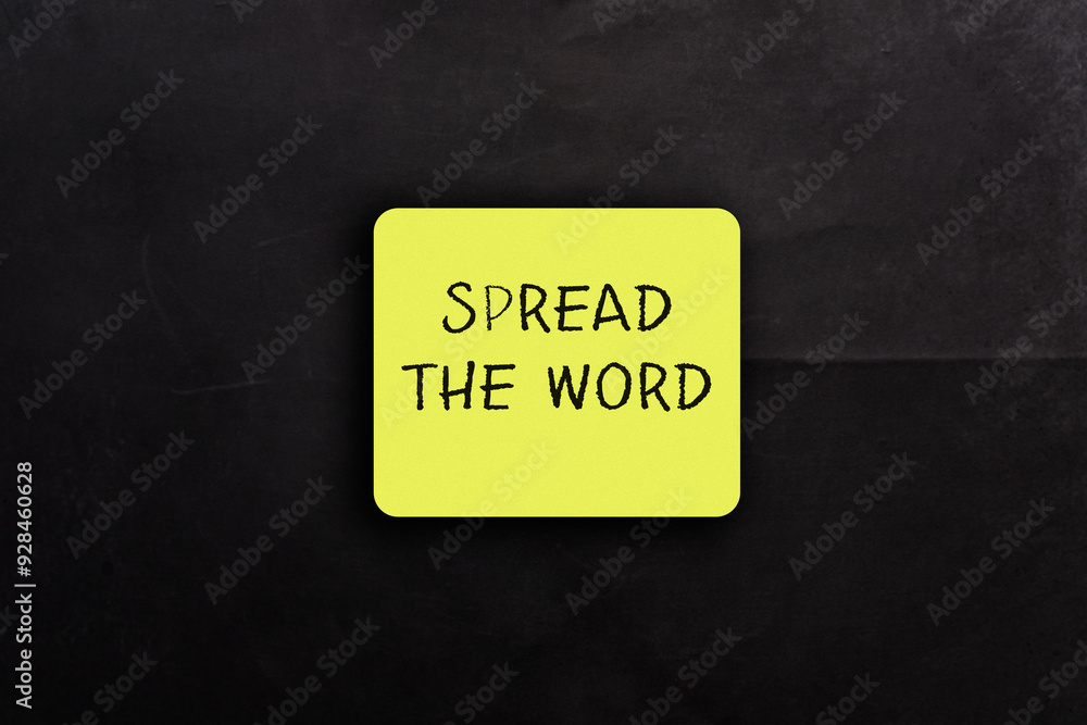 © Алла Морозова - A yellow sticker with the words Spread the Word written on it. The sticker is placed on a black background © Алла Морозова - A yellow sticker with the words Spread the Word written on it. The sticker is placed on a black background