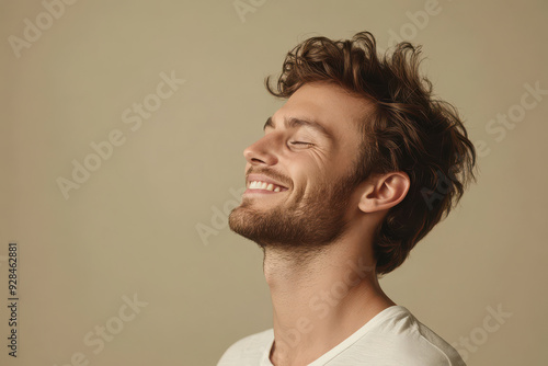 A close up of a man's face with his eyes closed