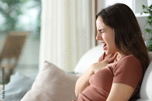 Free Download Stressed woman choking trying to breath at home - GFXLoad