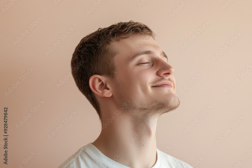 Fototapeta premium A close up of a man's face with his eyes closed