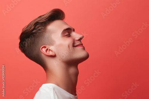 A close up of a man's face with his eyes closed