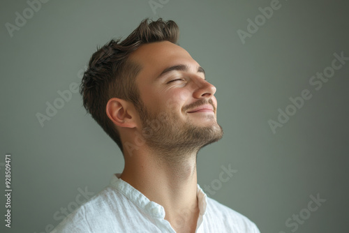 A close up of a man's face with his eyes closed