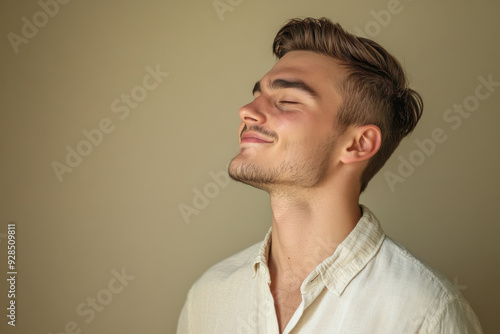 A close up of a man's face with his eyes closed