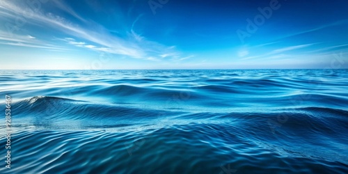 Soothing image of calm blue ocean water surface waves with a clean background