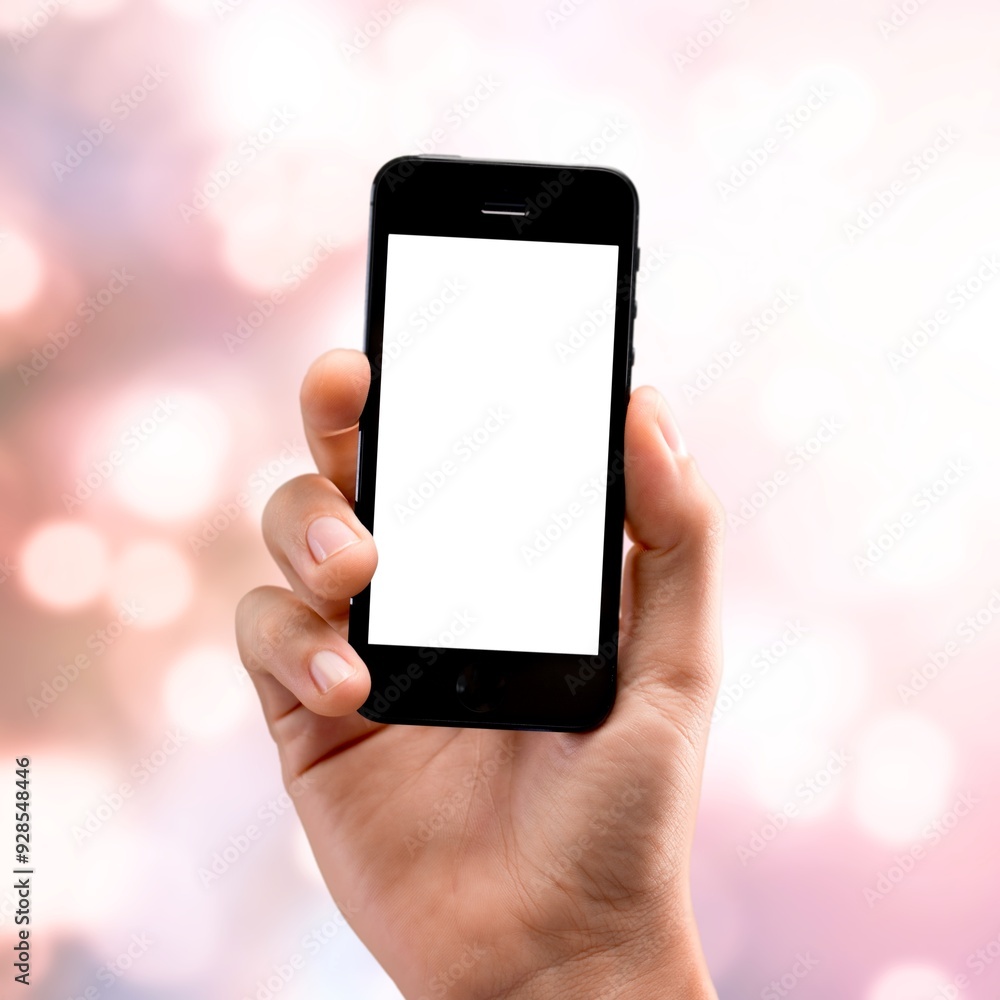 Human hand holding smart phone with a blank screen