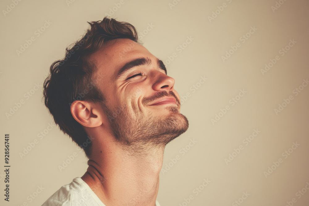 Obraz premium A close up of a man's face with his eyes closed