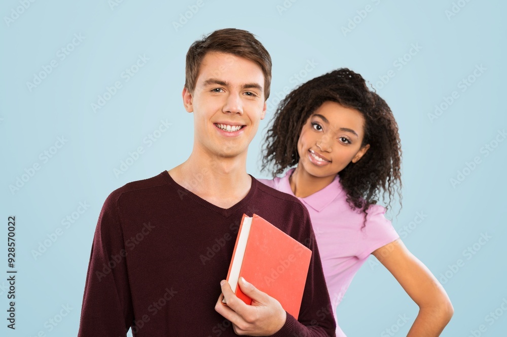 Happy young couple of students posing Happy young couple of students posing