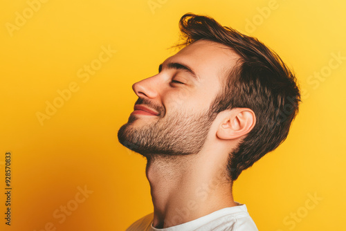 A close up of a man's face with his eyes closed