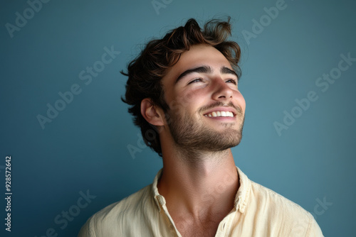 A close up of a man's face with his eyes closed