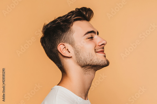 A close up of a man's face with his eyes closed