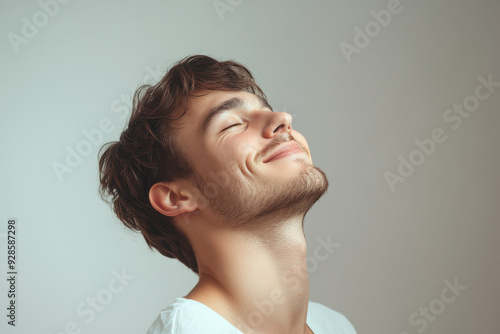 A close up of a man's face with his eyes closed