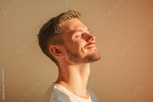 A close up of a man's face with his eyes closed