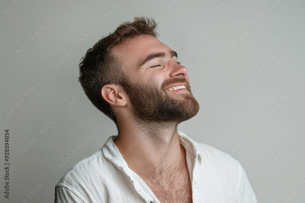 Fototapeta premium A close up of a man's face with his eyes closed