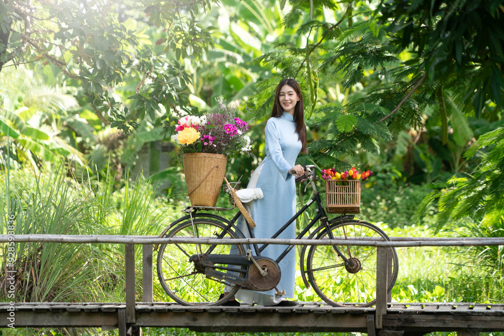 Beautiful Asian women in traditional Vietnam fashion dress.