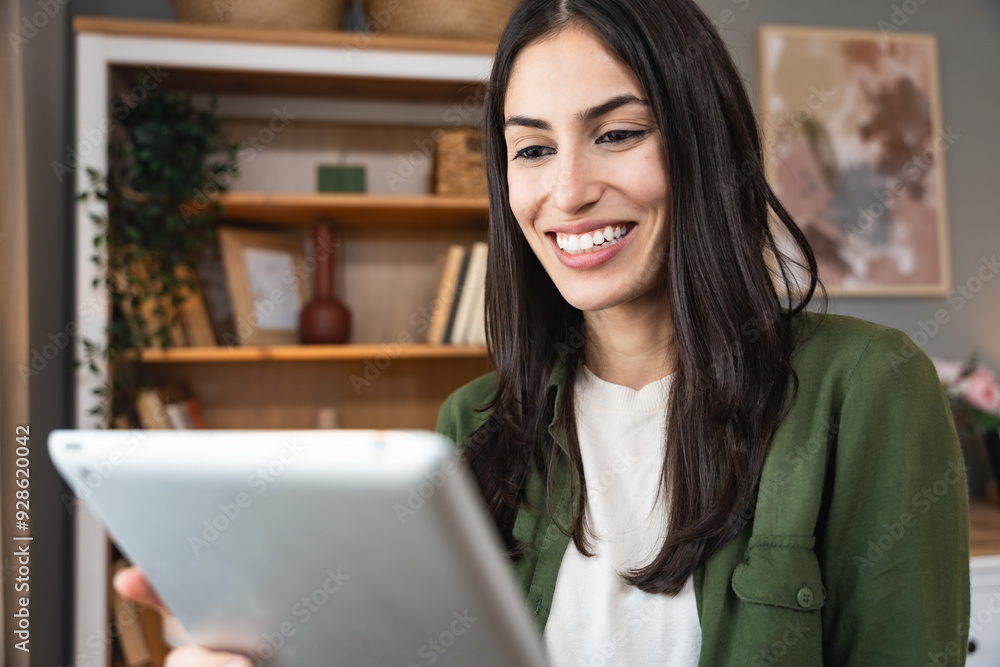 Real estate agent with tablet pc looking through window. Young business woman working at home, using device gadget. Successful professional occupation graphic designer female taking a break from work. Real estate agent with tablet pc looking through window. Young business woman working at home, using device gadget. Successful professional occupation graphic designer female taking a break from work.