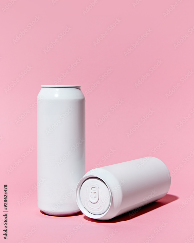 Minimalistic mockup featuring two sleek, white aluminum cans on pink background. Beer, lemonade, soda water, energy drinks packaging. Ideal for branding projects focused on modern beverage designs Minimalistic mockup featuring two sleek, white aluminum cans on pink background. Beer, lemonade, soda water, energy drinks packaging. Ideal for branding projects focused on modern beverage designs