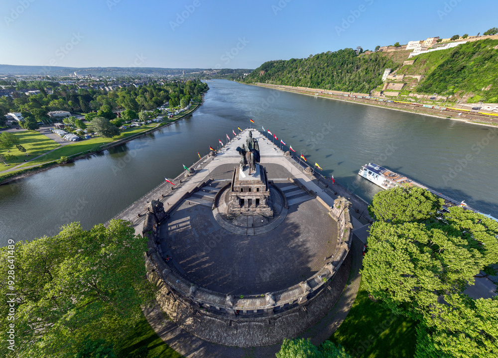 Deutsches Eck or German Corner headland in Koblenz, where the Mosel river joins the Rhine. Aerial 5k shot