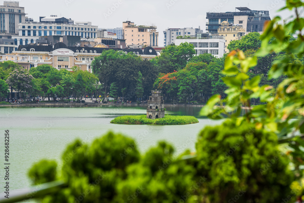 Obraz premium Aerial skyline of Hoan Kiem Lake or Ho Guom, Hoan Kiem Lake area in the morning. Hoan Kiem is the center of Hanoi city, Vietnam, Asia