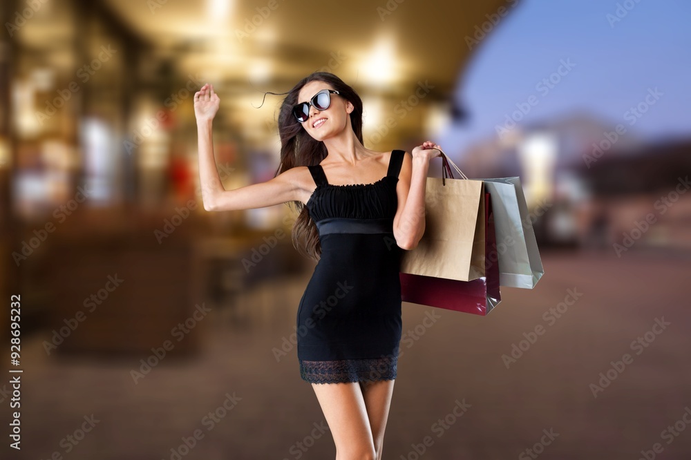 Fototapeta premium Beautiful young women shopping in department store.