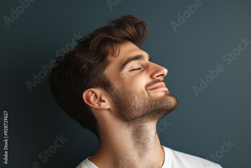 A close up of a man's face with his eyes closed