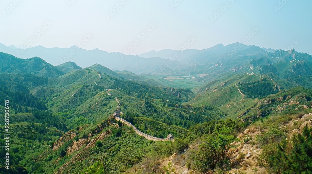 Create a photo of the Great Wall of China, highlighting its extensive length, historical significance, and breathtaking mountainous surroundings.