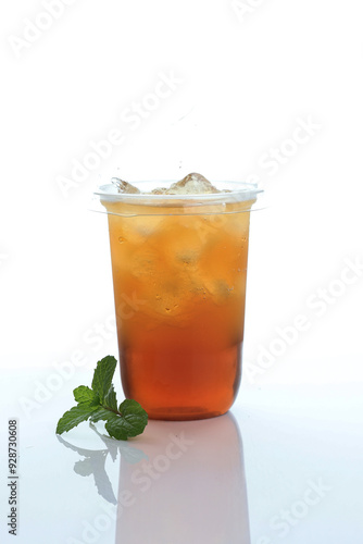 Cold Ice Tea with Mint Leaf on White Table