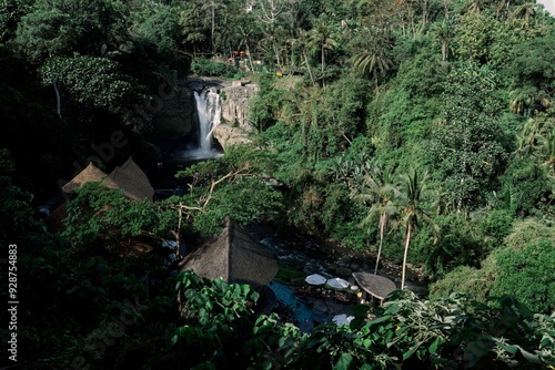 Balinese background view of waterfall river Tegenungan Bali photo