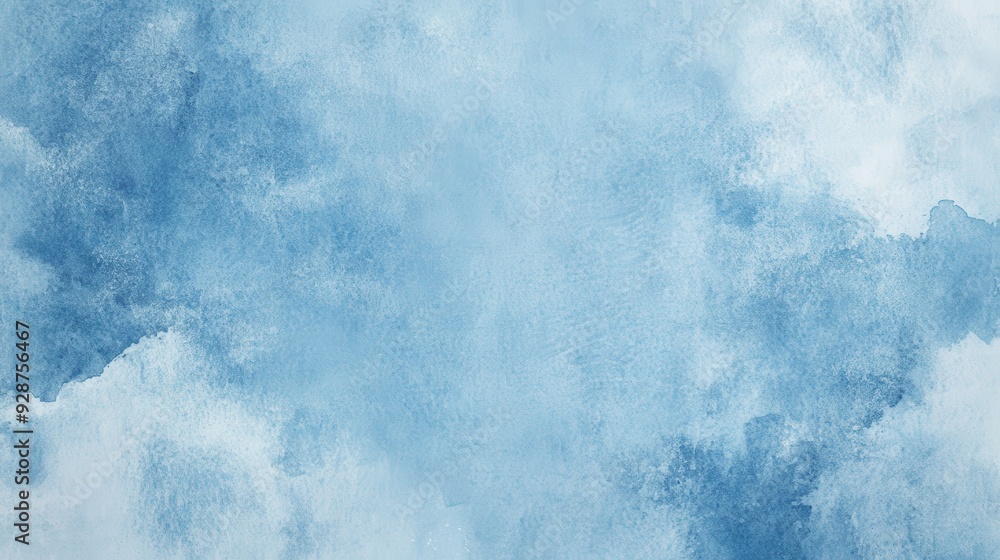 Fototapeta premium A soft blue watercolor texture with varying shades and gradients.