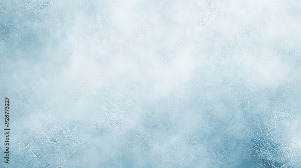 Fototapeta premium A soft, textured blue background resembling ice or frost, suitable for graphic design.