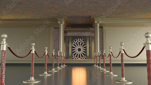 pathway with golden barriers leading to a big door with arabesque motif