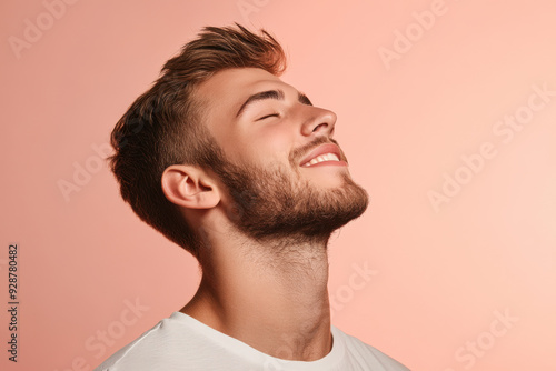 A close up of a man's face with his eyes closed