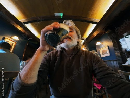 Photography Dublin Pub Man drinks a Local Irish beer
