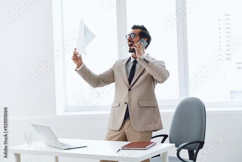 Smile man video call talk computer businessman phone office