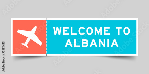 Orange and blue color ticket with plane icon and word welcome to albania on gray background