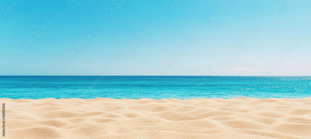 Fototapeta premium Panoramic view of a sandy beach with gentle waves and a clear blue sky, showcasing the serene beauty of a tropical coastline.