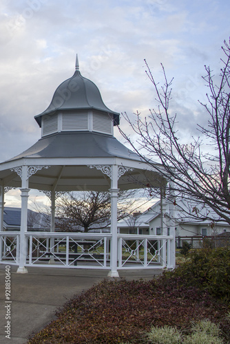 This photograph features a charming white wooden gazebo with grey roof at Central Park Bowral Southern Highlands New South Wales Australia photo